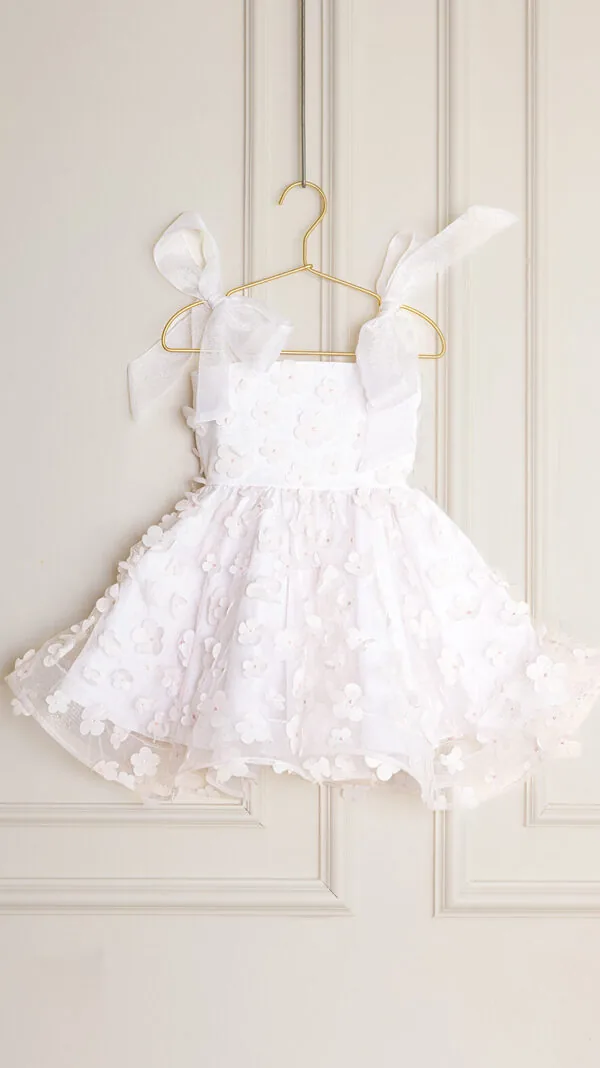 girls flower dress sewing pattern with smocked bodice and bow straps, toddler party dress pattern sizes 12 months to 12 years