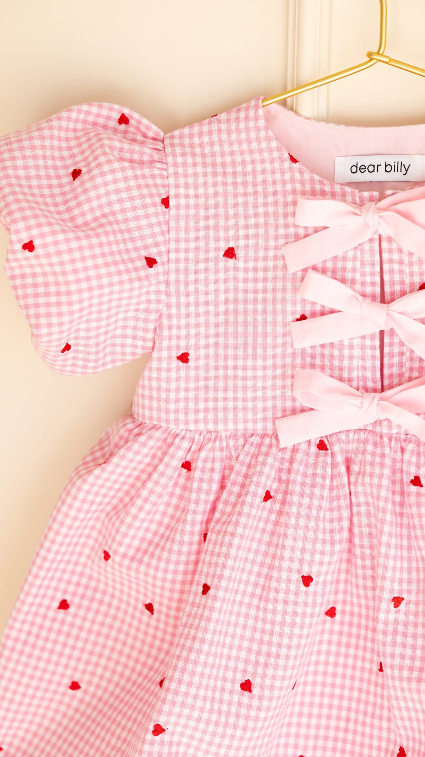 Pink gingham girls dress by Dear Billy