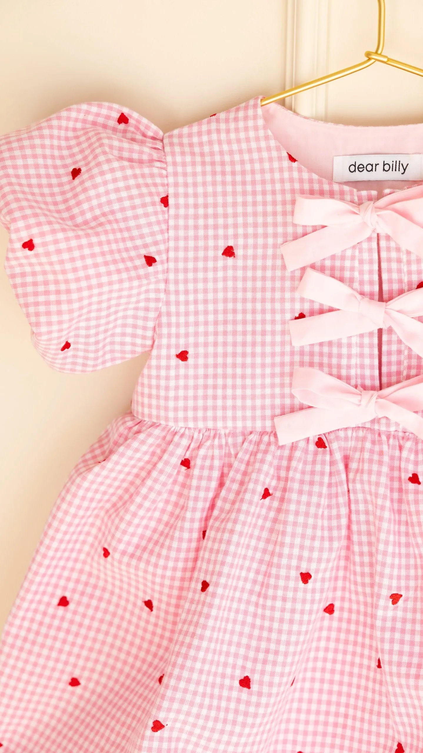 Pink gingham girls dress by Dear Billy