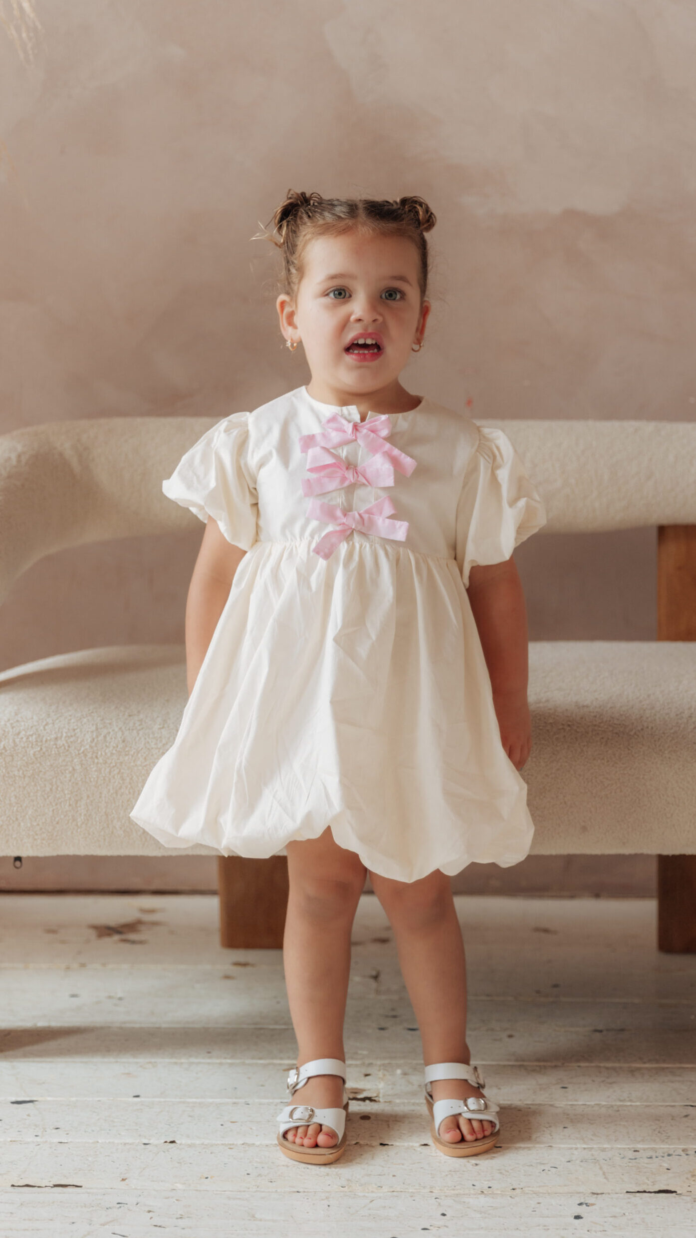 Puff dress PDF pattern with voluminous skirt and bow-front closure