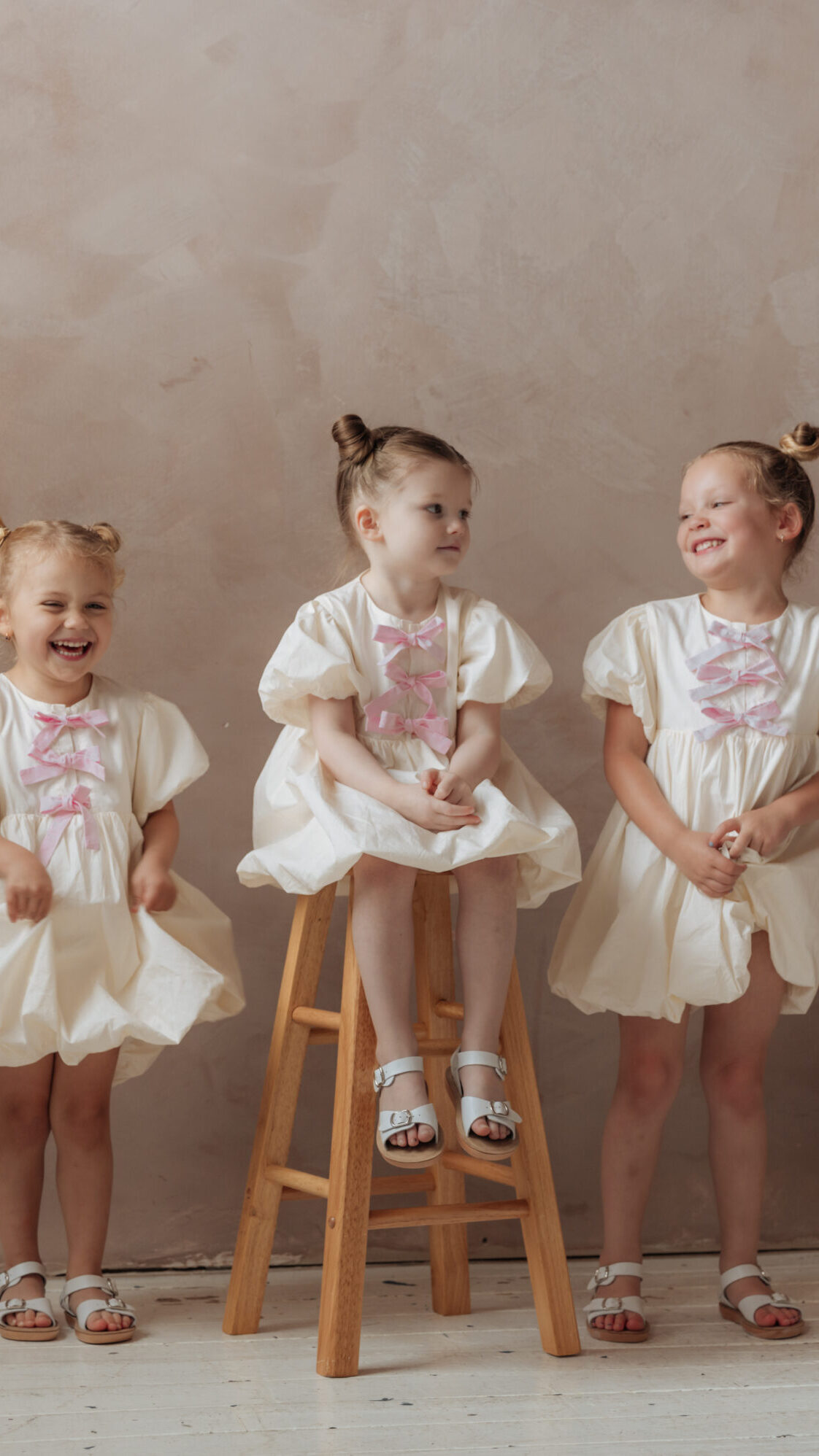 Bubble dress sewing pattern with gathered skirt and decorative bows