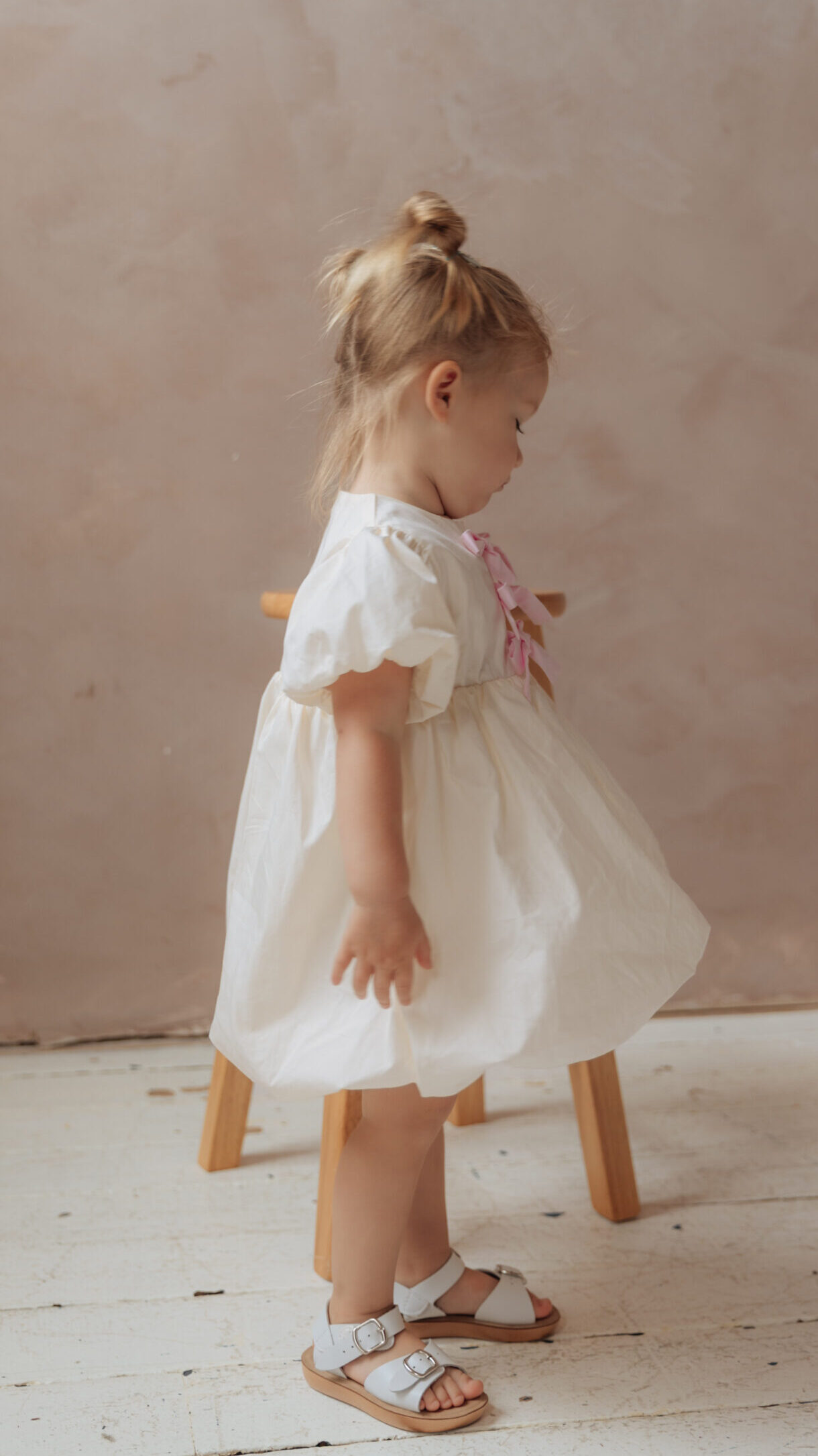Modern puff dress pattern with bubble hem and bow detail