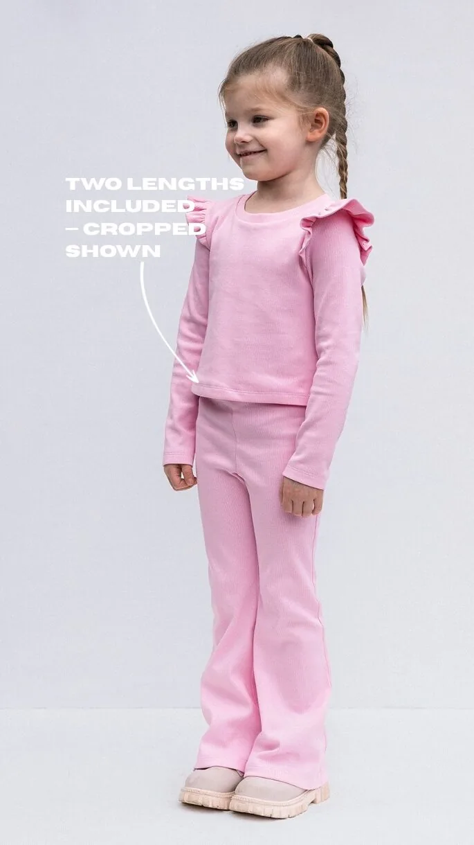 Detail of shoulder ruffle on girls long sleeve top sewing pattern Darling Set