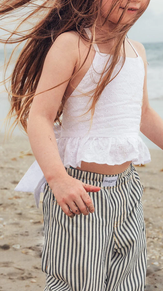 Girls sewing pattern for halter neck top, open back design with bow tie detail