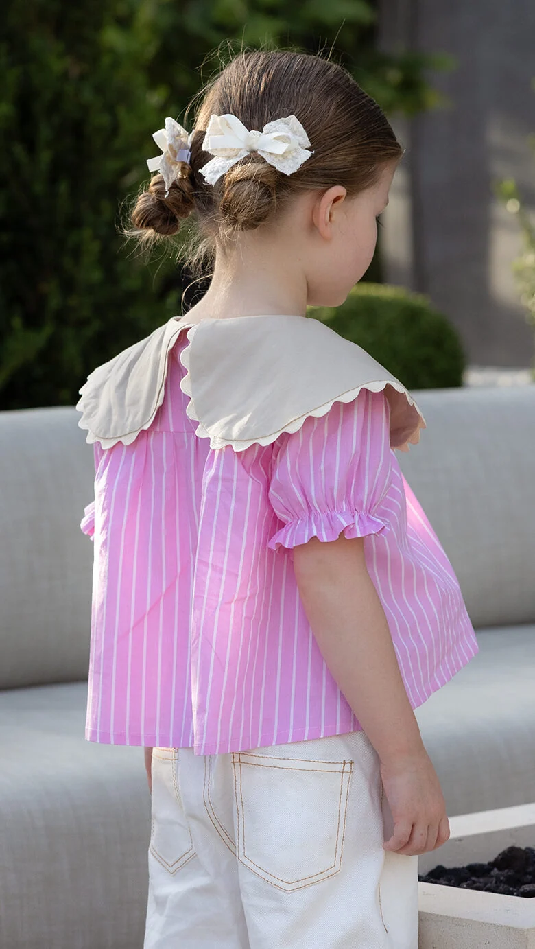 Oversized collar blouse sewing pattern for girls with back button closure and gathered neckline