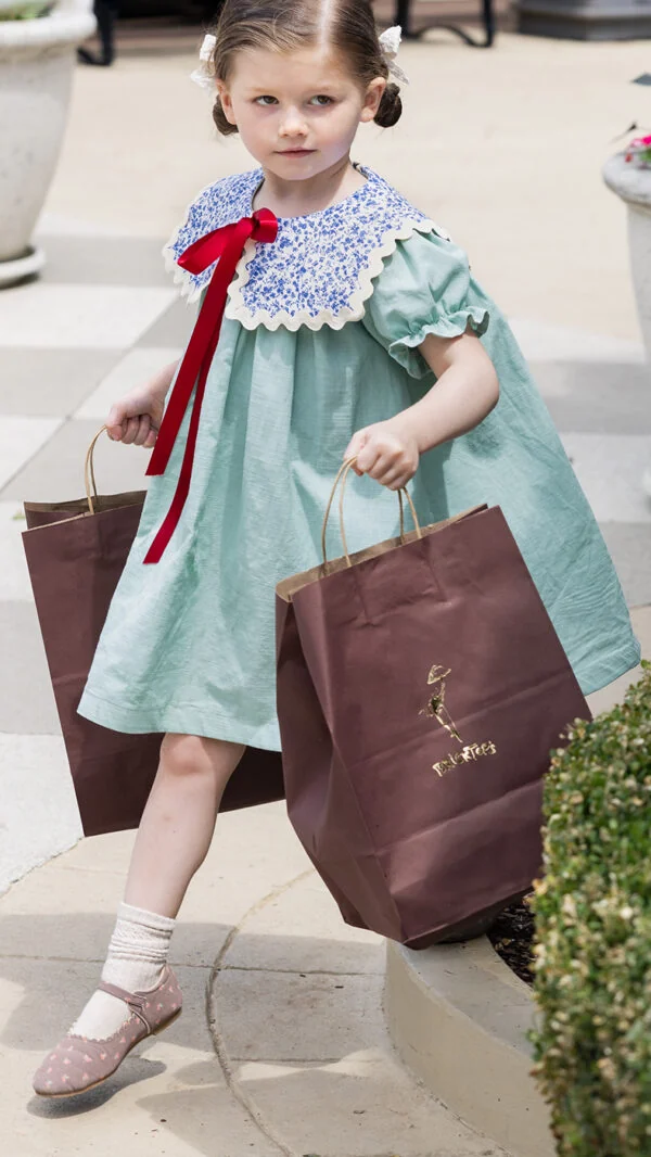Vintage-inspired children's dress pattern with modern oversized collar detail
